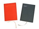 Notizbuch (rot oder blau)